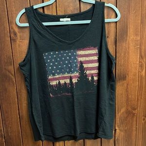 Maurice’s black tank top